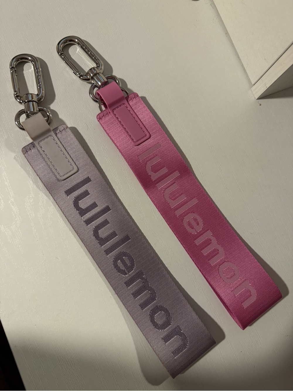 lululemon athletica Dual Wrist Strap Keychains in Pink and Light Purple
